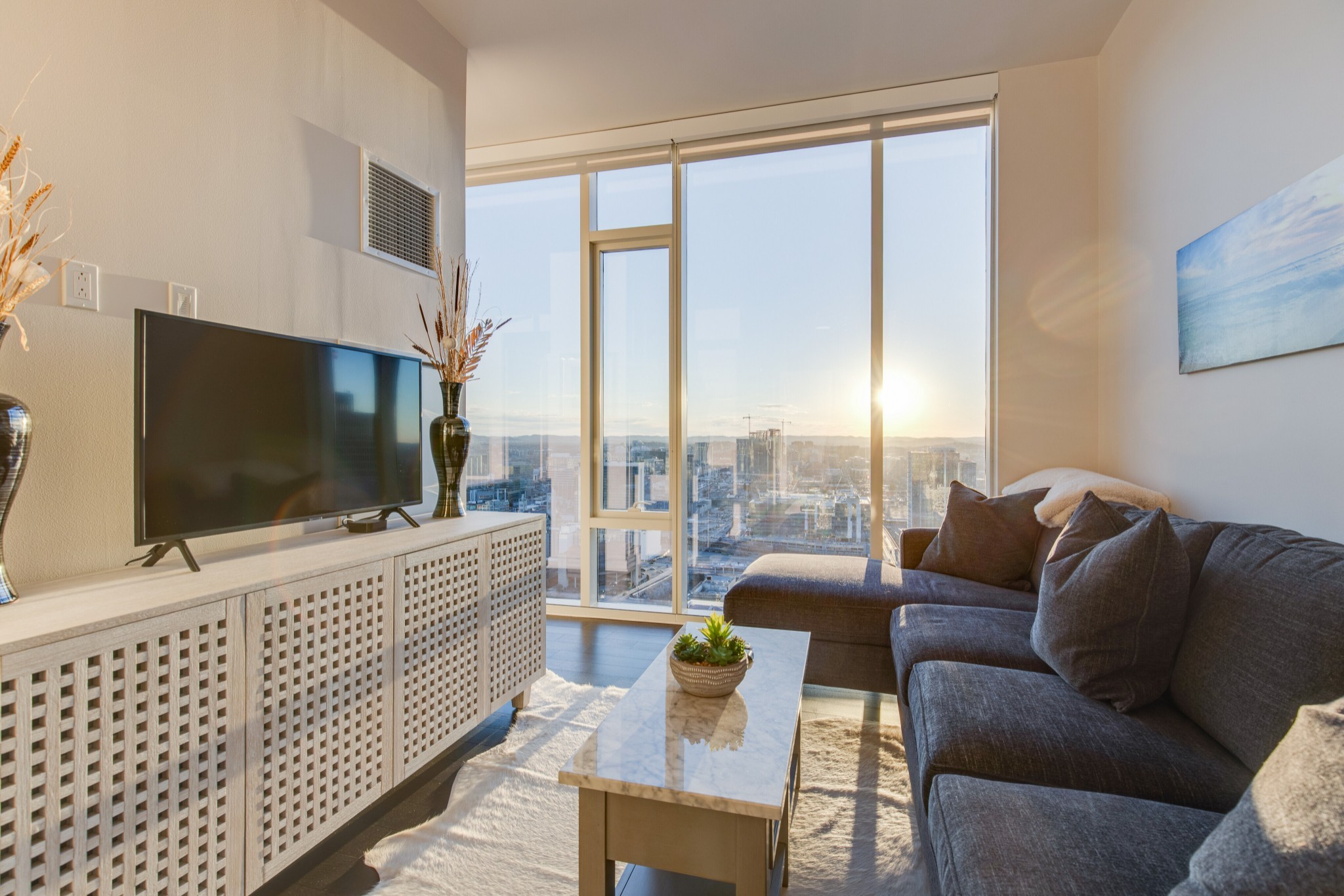 Furnishings and sunset views over the city included!