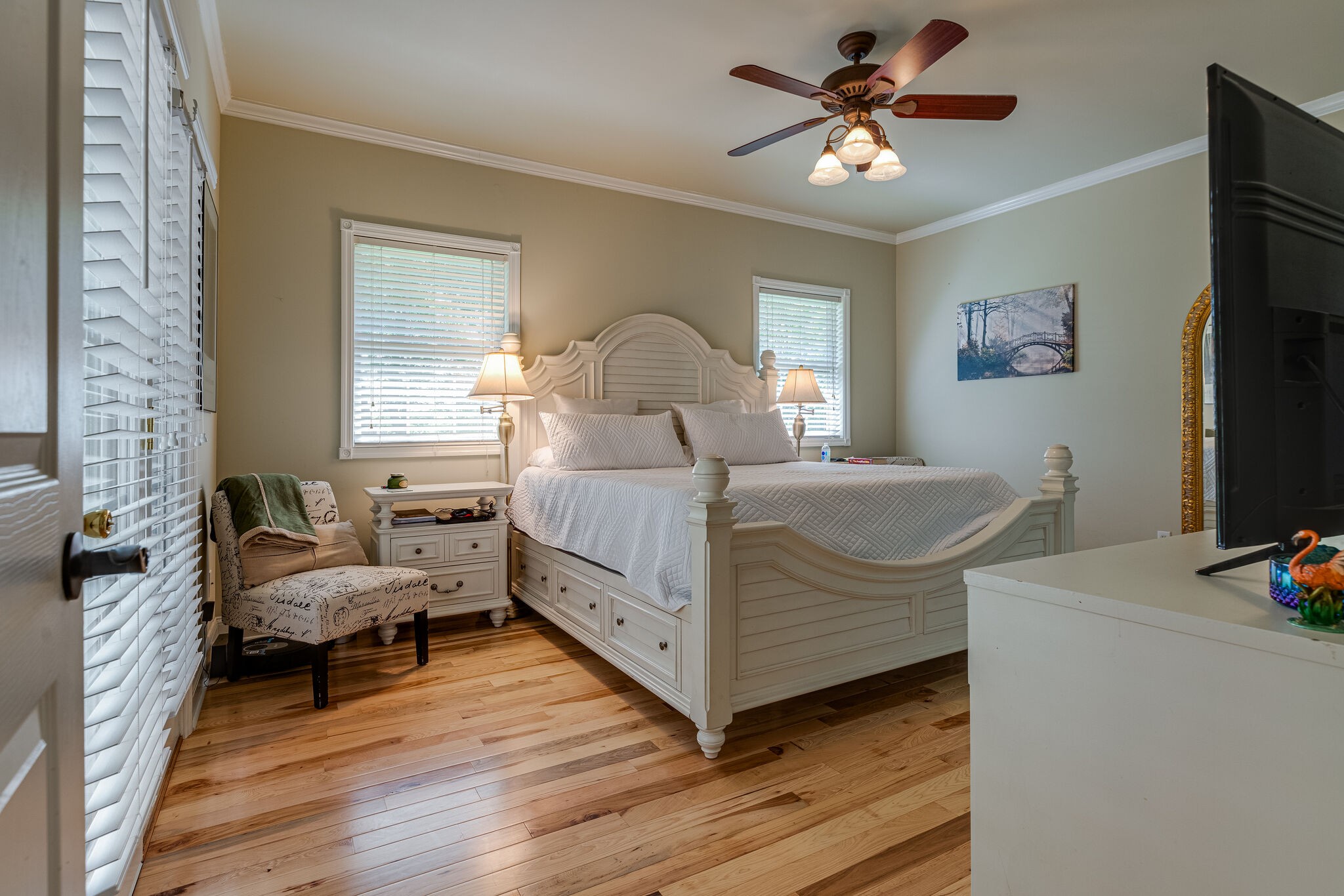 Master Bedroom with Stylish Hickory Wooden Floors.